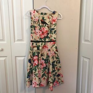 Cream floral bird dress with black belt size S